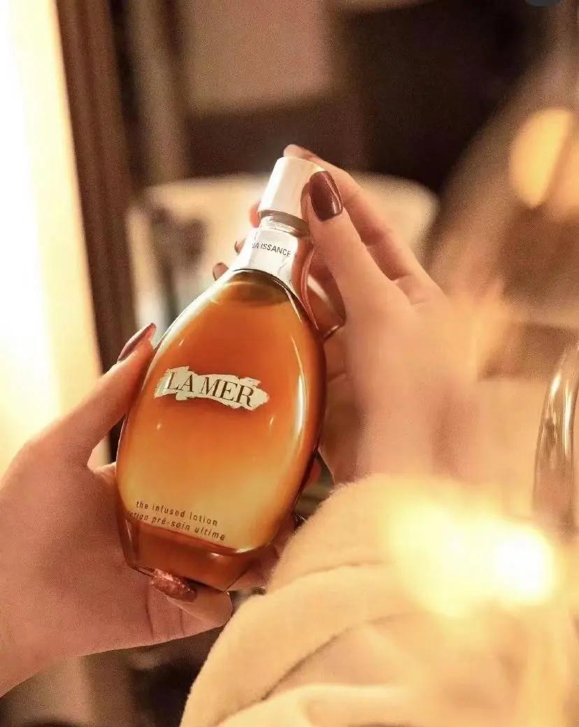 lamer海蓝之谜鎏金精华水,海蓝之谜lamer鎏金焕颜修护精华露