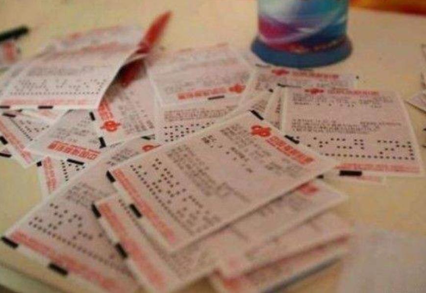 买两块钱的彩票能中500万吗,两块钱的彩票彩票店能赚多少