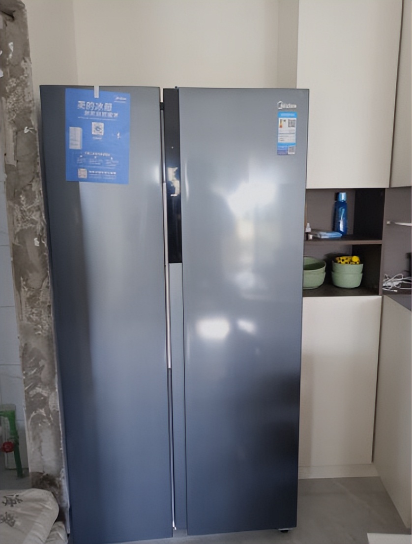 冰箱海尔容声美的怎么选,买冰箱海尔品牌好还是美的好