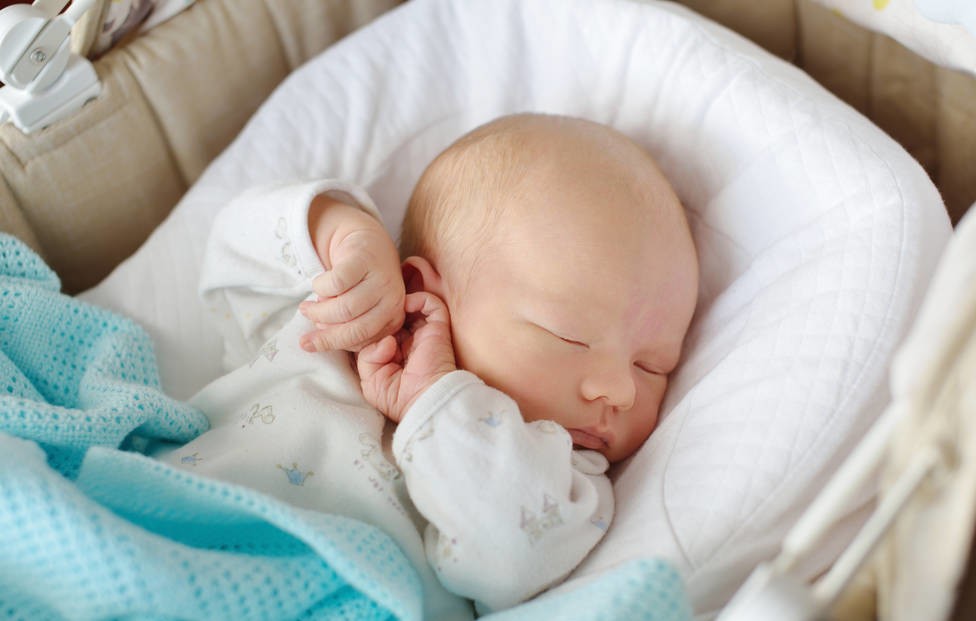 婴儿轻度脑积水是什么原因引起,新生儿轻微脑积水怎么治