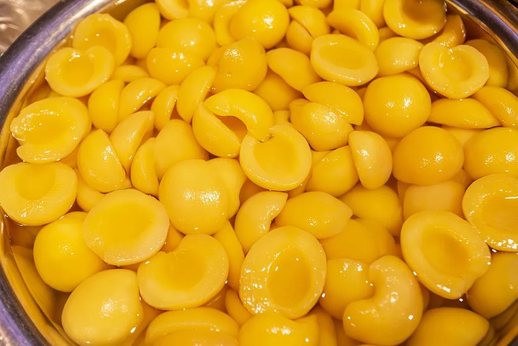 东北特色黄桃罐头有哪些,行走在大连的东北黄桃罐头