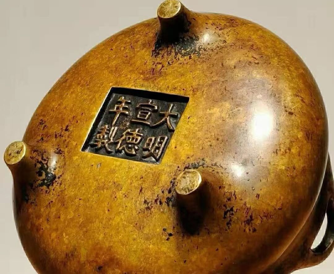 宣德炉黑漆古皮形成原因,珠光宝色的宣德炉